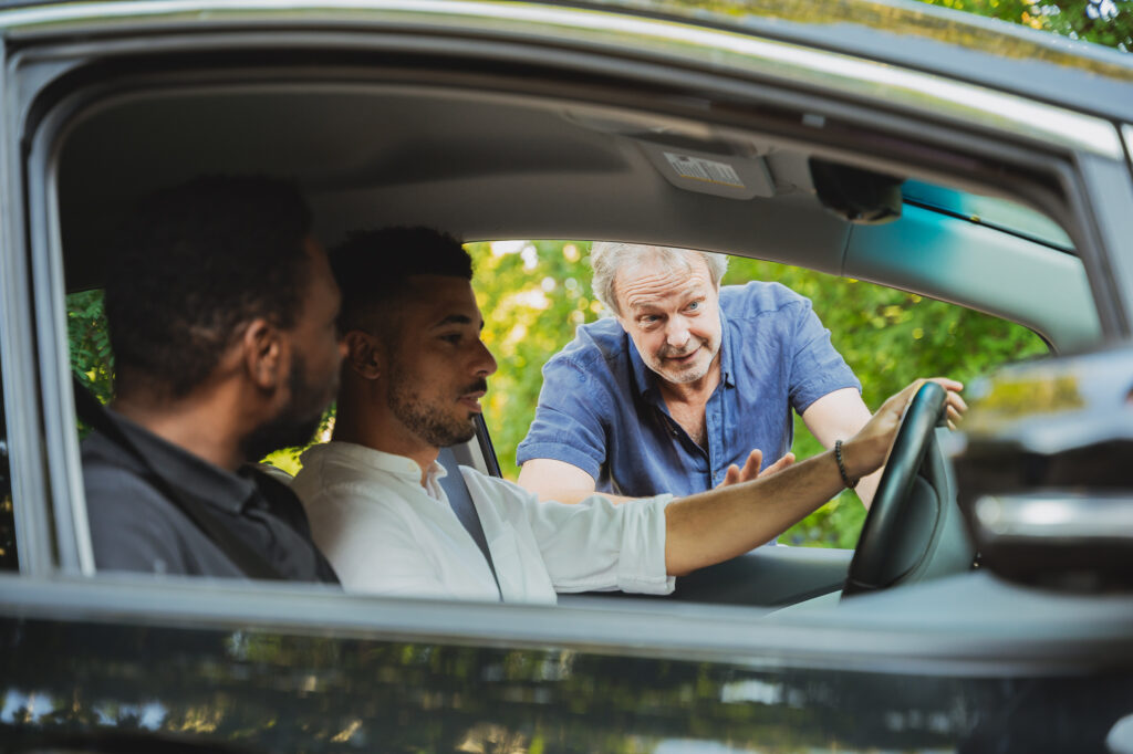 Robert gives his final advice before lending out his car © Audrey McMahon